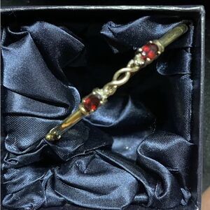 Elegant Gold and Red Gemstone Bracelet